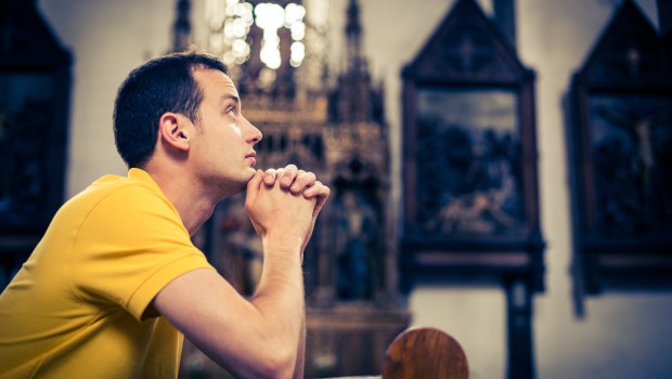 MAN PRAYING