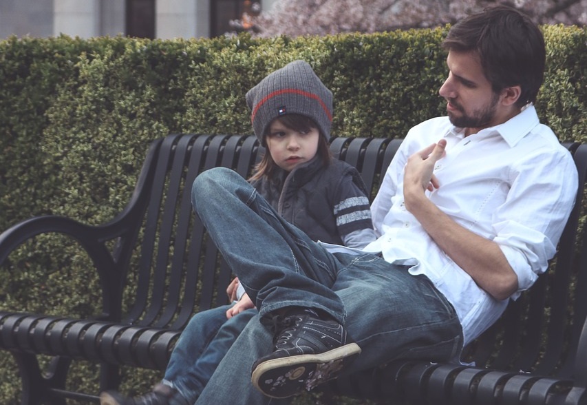 Father and child on a bench