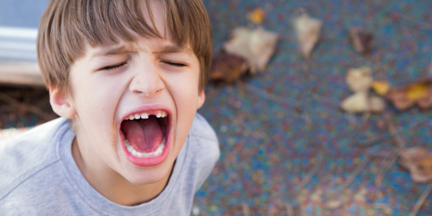 web3-little-boy-angry-yelling-crying-outside-missing-teeth-tantrum-shutterstock