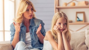 MOTHER TALKING WITH HER DAUGHTER