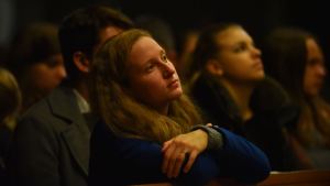 YOUNG WOMAN IN CHURCH