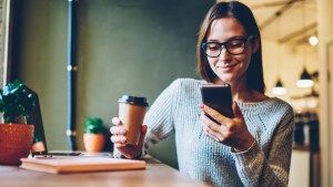 WOMAN READING NEWS