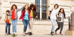 Happy teens having fun at school