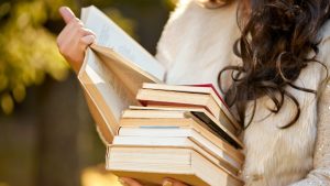 GIRL WITH BOOKS