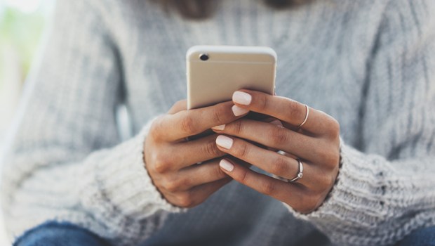 HOLDING PHONE