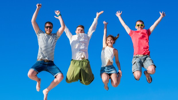 WEB3-Happy-young-group-of-people-jumping-in-blue-sky