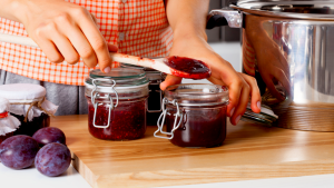 woman making fruit jam