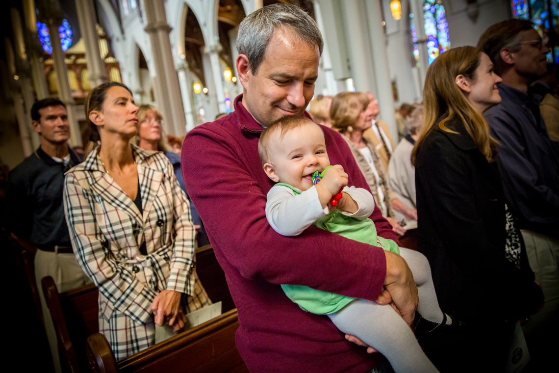 web-child-daughter-father-mass-smile-laugh-george-martell-for-the-archdiocese-of-boston.jpg