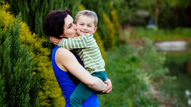 Mother and son cuddling