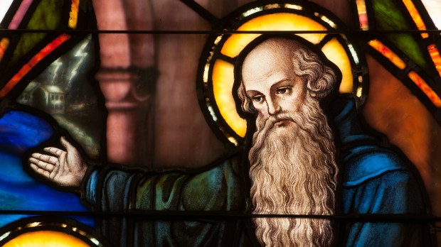 Detail of stained glass window depicting face of St. Benedict of Nursia