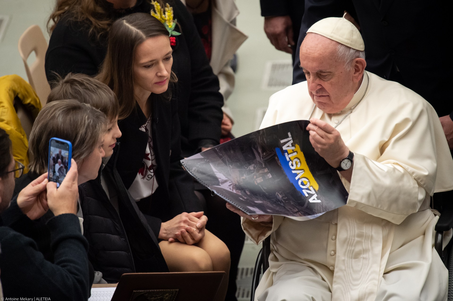 Pope Francis receives a gift from Yuliya Fedosiuk, wife of Azov battalion fighter Arseniy Fedosiuk