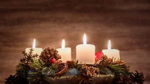 Advent wreath with four burning candles