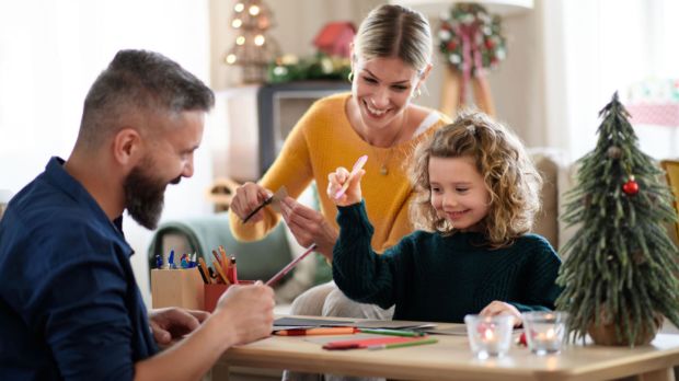 family-making-Christmas-cards_Ground-Picture_Shutterstock_1832512438.jpg
