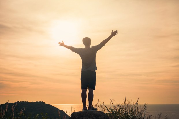 PRAY-MAN-BACK-shutterstock_533133535.jpg