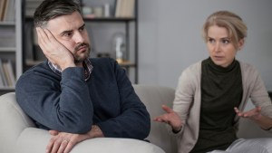 Upset man refusing to listen to his constantly complaining wife