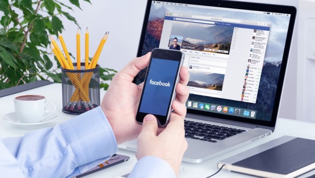 Facebook app on the Apple iPhone display and desktop version of Facebook