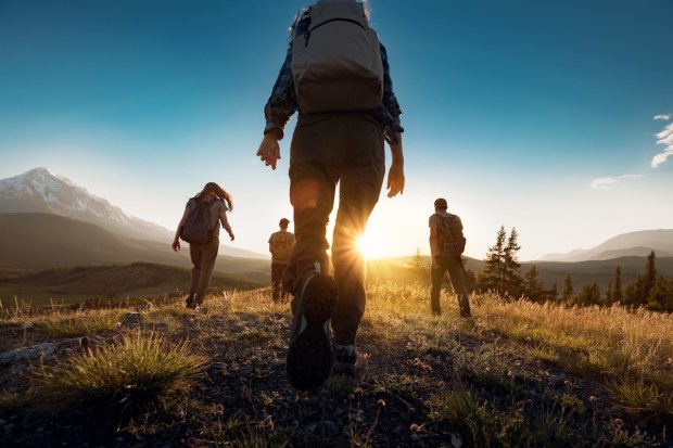 Group of sporty people walks in mountains at sunset with backpacks. Altai mountains, Siberia, Russia. | traveler,dusk,high,mountain,fitness,action,group,exploration,journey,active,hike,girl,friends,adventure,outside,person,vacations,backpacking,silhouette,dawn,trekkers,sunrise,woman,activity,trekking,weekend,back,tourism,endurance,holiday,summer,tourist,backpacker,walking,man,hiker,leisure,together,nature,hiking,team,lifestyle,outdoor,healthy,backpack,sunset,travel,sport,walk