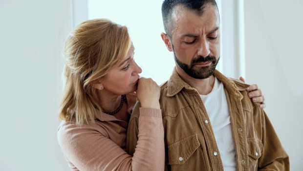 Wife supporting upset husband