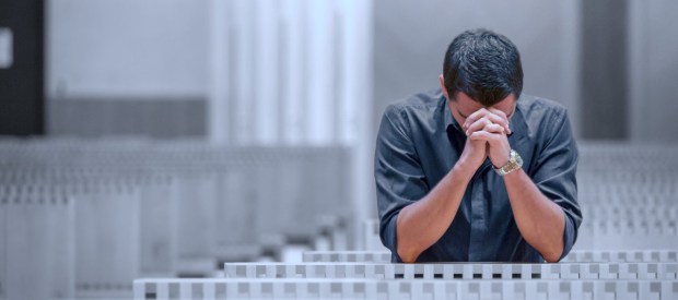 Misunderstood man praying