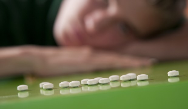 Teen lines up pills