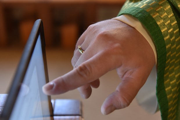 priest; tablet