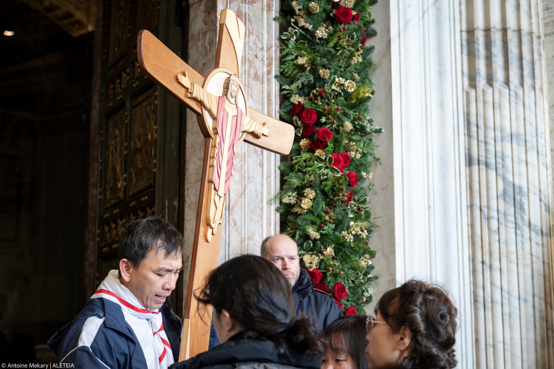 Groups of pilgrims enter St Peter's Basilica through the Holy Door a day after Pope Francis opened it for the start of the Catholic Jubilee Year 2025, in the Vatican on December 25, 2024.