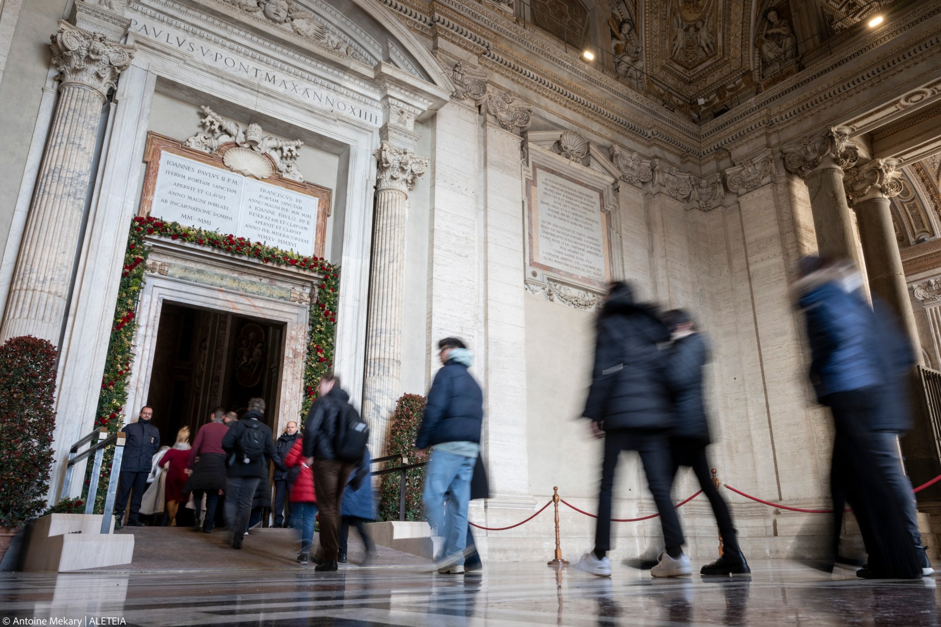 Groups of pilgrims enter St Peter's Basilica through the Holy Door a day after Pope Francis opened it for the start of the Catholic Jubilee Year 2025, in the Vatican on December 25, 2024.